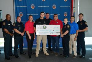Dallas Margarita Society Grant Delivery to Santa Cop