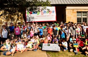 Dallas Margarita Society Grant Delivery to Camp iHope