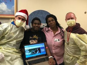 Dallas Children's Charities Laptop Delivery to Christopher